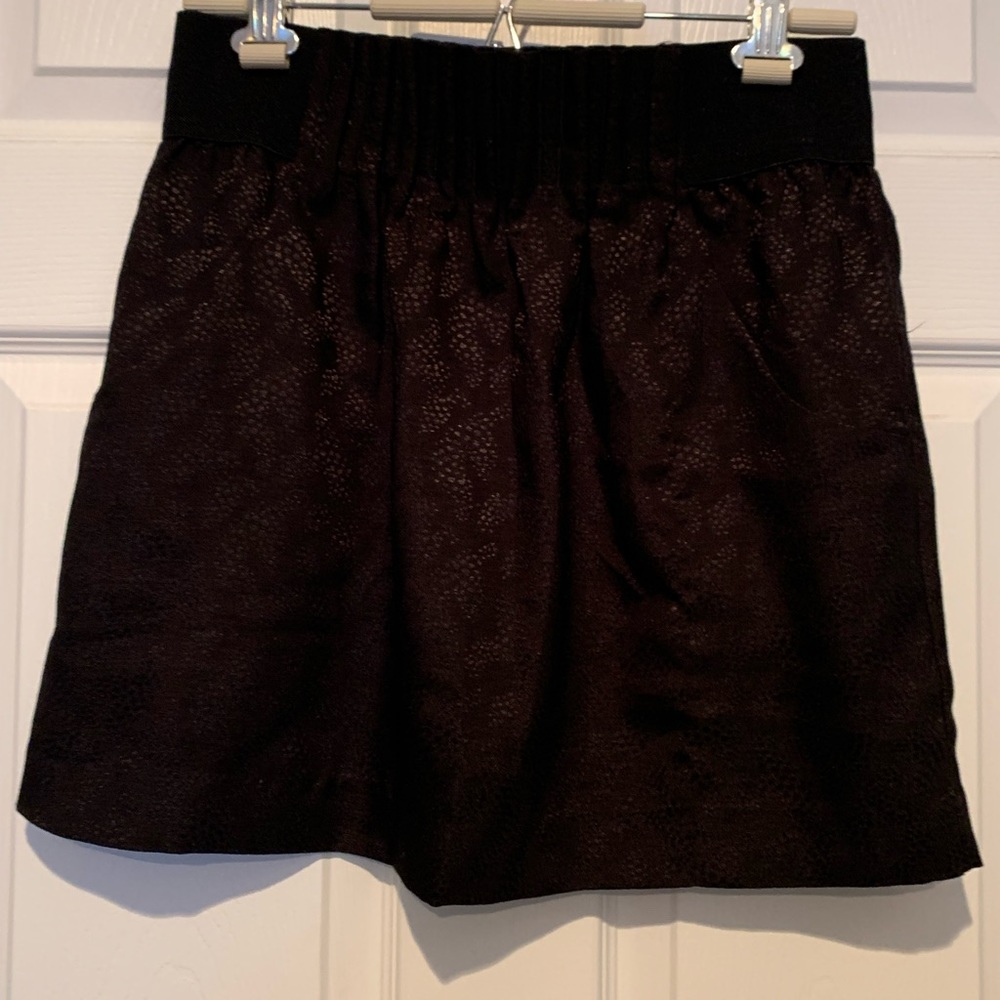 Calvin Klein black skirt with pockets. Size 8.